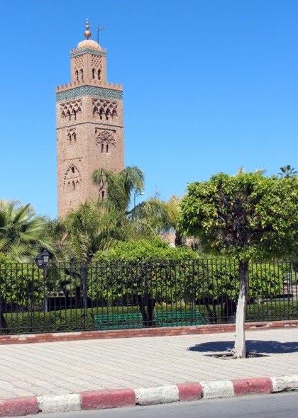 The Koutoubia Mosque minaret above palm trees, Marrakech
